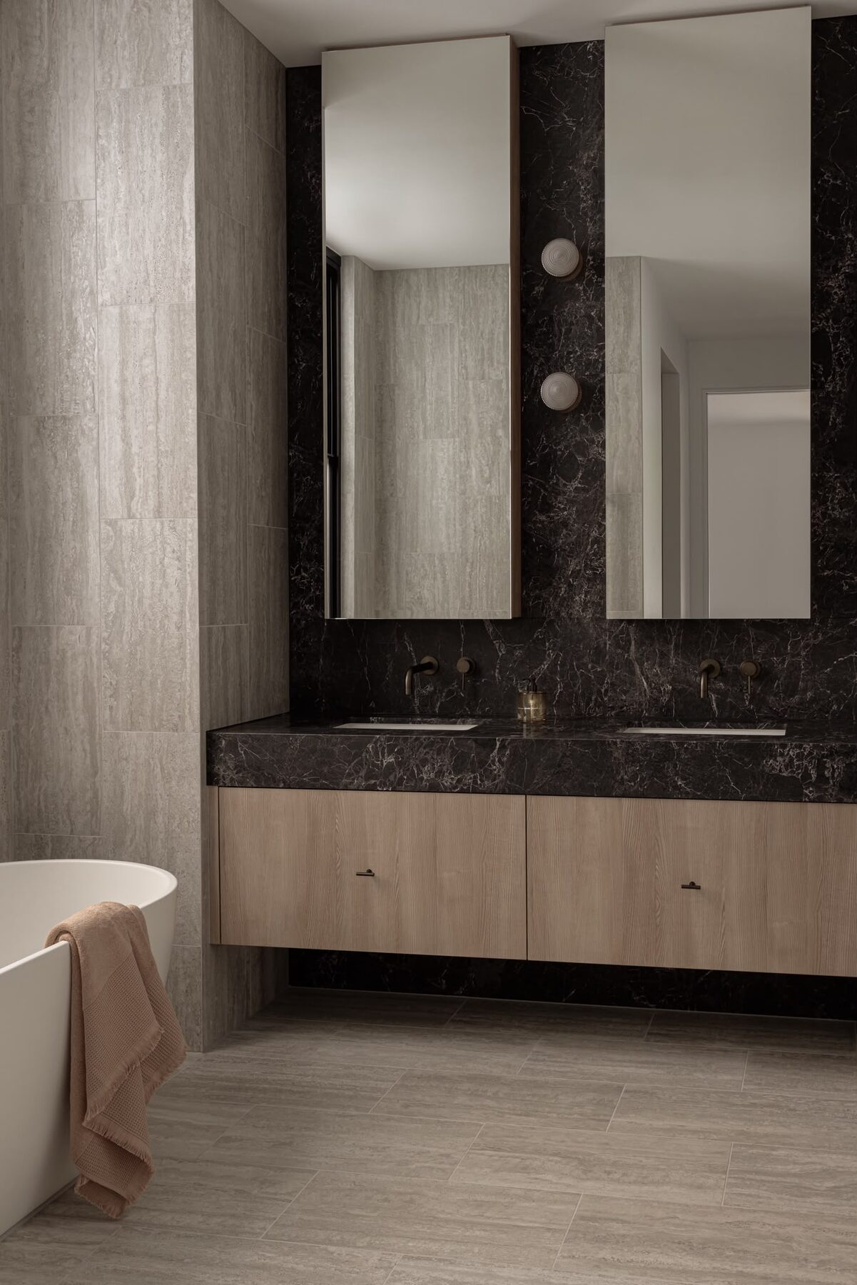 Alphington Residence — ensuite with dark marble vanity and freestanding bath