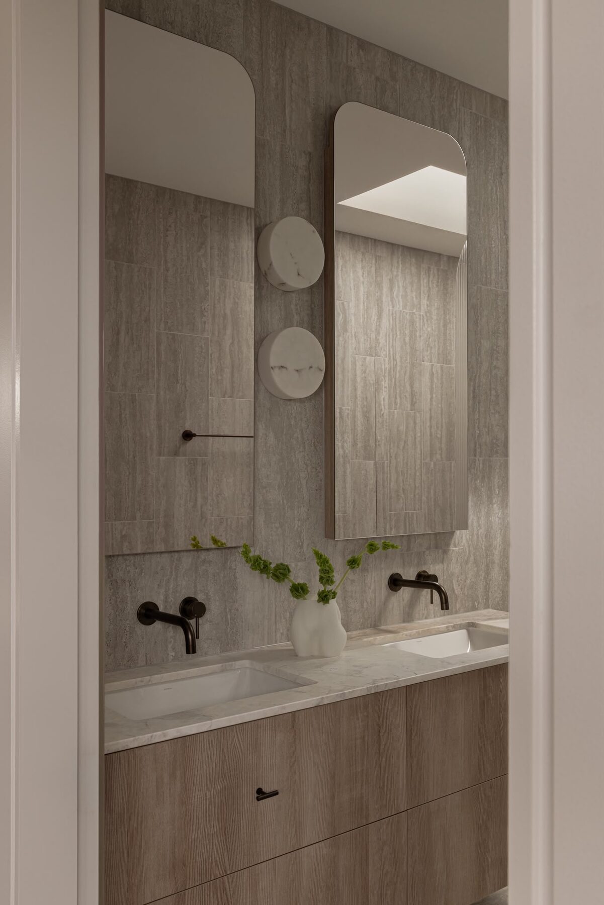 Alphington Residence — bathroom vanity with arched mirrors