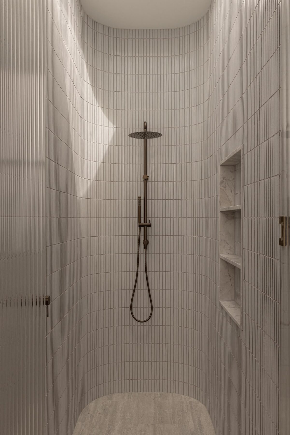 Alphington Residence — curved tiled shower with skylight