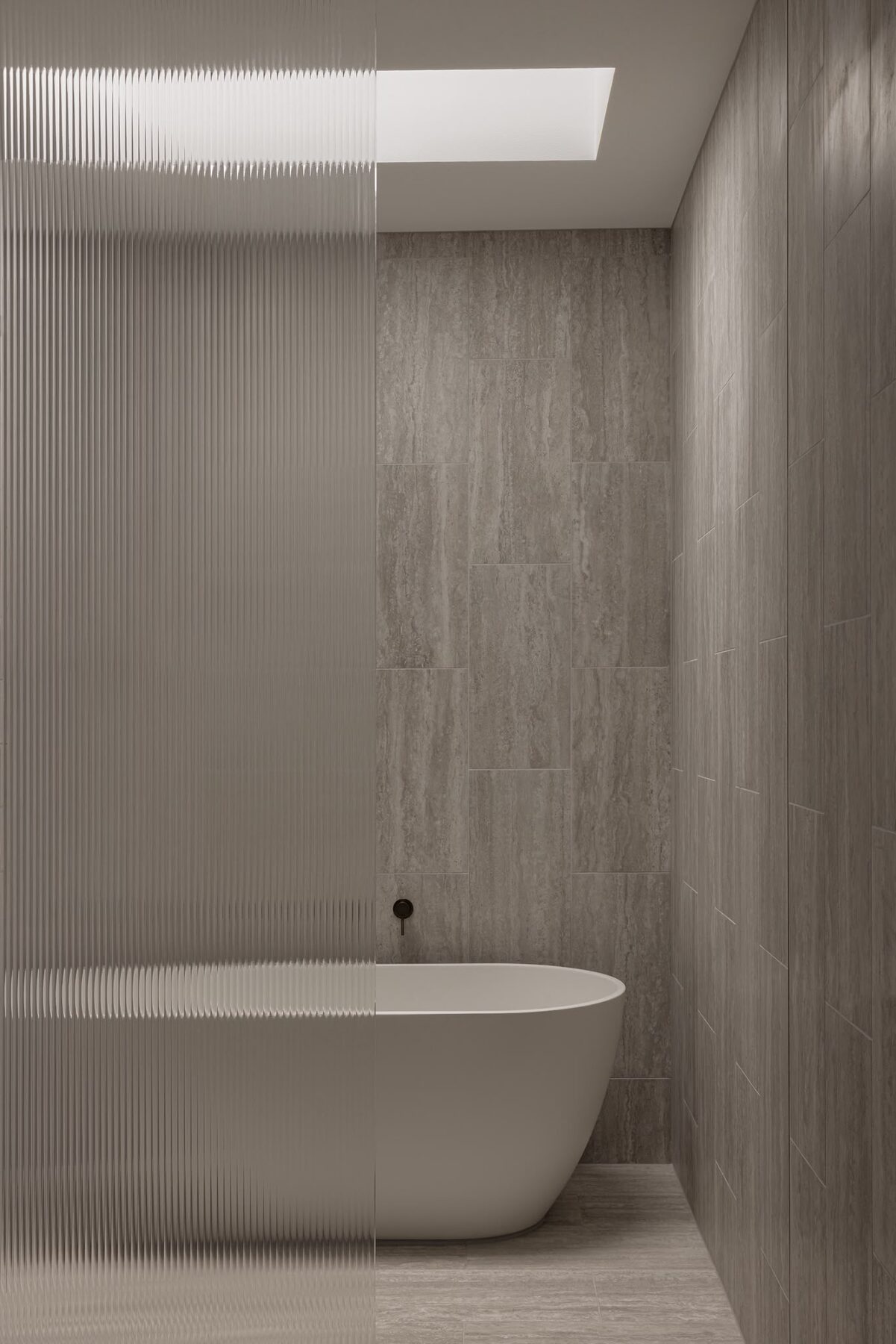Alphington Residence — freestanding bath beneath a skylight